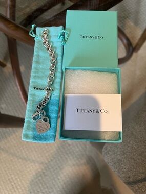 Tiffany & Co. Sterling Silver Heart Tag Bracelet with Signature Blue